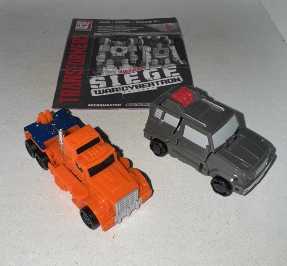 Transformers Powertrain & Highjump Siege Micromasters Off-Road Patrol 100% Foto 3 de 4