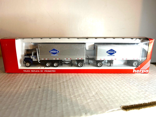 HERPA #6053 GMC cabina general con remolques de caja de 2-27' "Overnite" H.O. 1:87 | Zustand: New