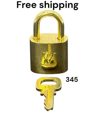 Preloved Authentic louis vuitton padlock a Key 345 .
