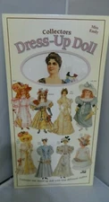  COLLECTOR'S DRESS UP DOLL " MISS EMILY"  MADE IN ENGLAND    YELLOW FOLDER