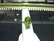 VINTAGE WOMENS PERIDOT 14 KARAT YELLOW GOLD RING SIZE 7.0 OVAL 6.0 CARAT WOW 