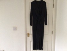Ladies black evening dress. Ruched knot middle. Collar & V neck. Side splits.