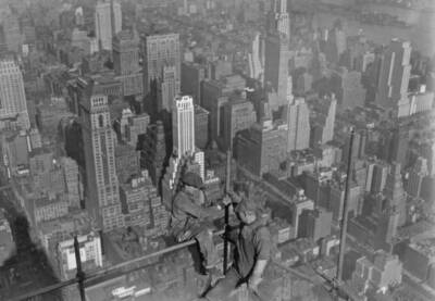 Workers conversation atop scaffolding 102 storey Empire State Buil Old Photo