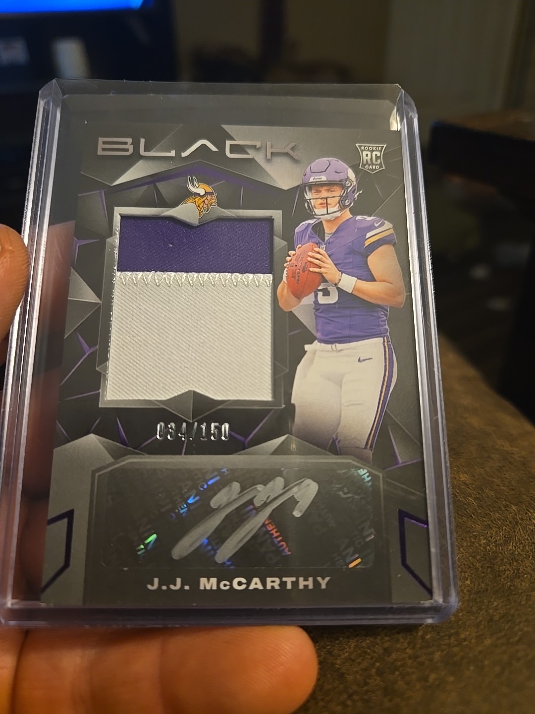 2024 Panini Black - Rookie Patch Autograph J.J. McCarthy #202 Royal /150