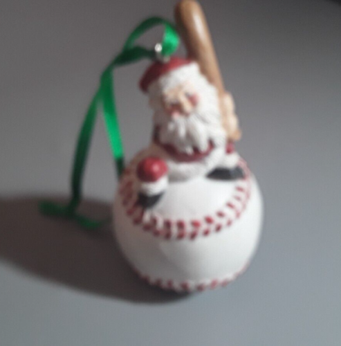 Santa sitting on a Baseball Ceramic Ornament - Picture 1 of 3
