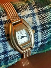 Womans gold Liz Claiborne watch