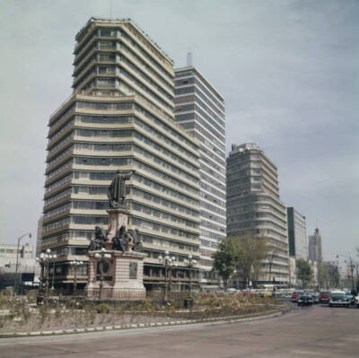 Paseo de la Reforma In Mexico City Cars drive past the Monument to- 1960 Photo