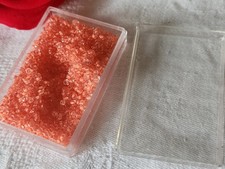 Lot environ 20 grammes de perles de rocaille saumon rose transparente n°5