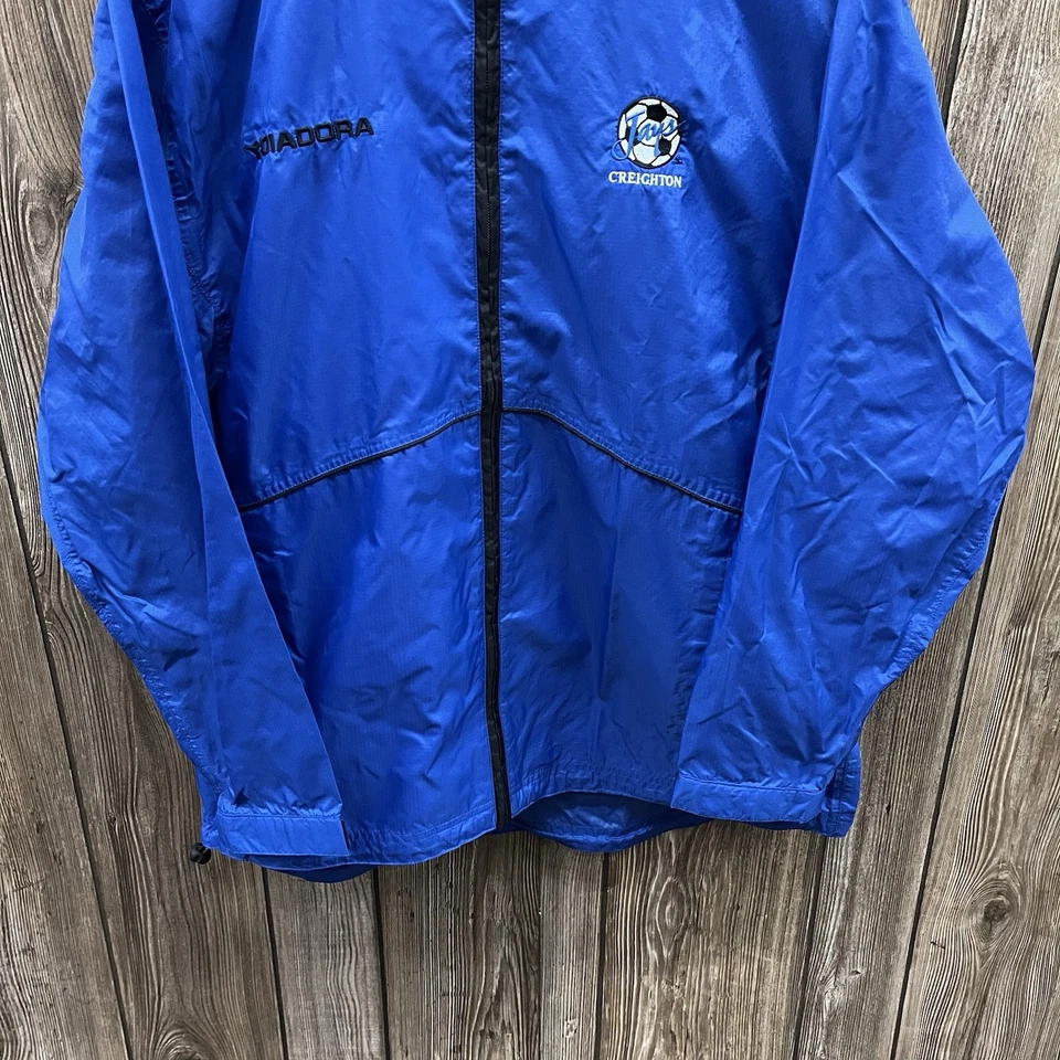 Chaqueta cortavientos vintage Creighton Bluejays fútbol cremallera azul para hombre mediana Foto 4 de 4