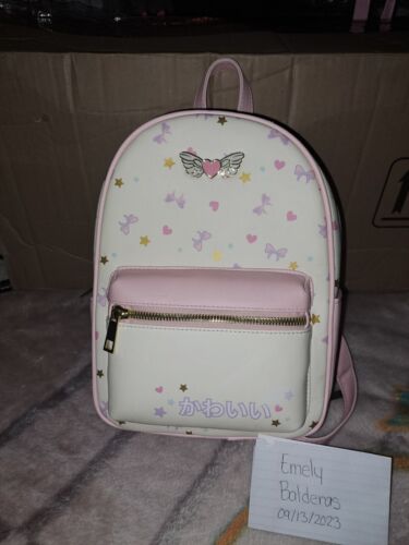 Sanrio Loungefly Loves Hello Kitty print backpack with bows & ears *Flawed