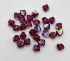 Swarovski Crystal Ruby AB Bicone Beads; 4mm 24pc or 6mm 12pc