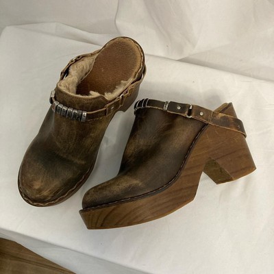 fur lined wooden clogs