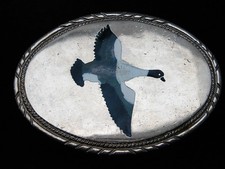 QD11104 VINTAGE 1983 DUCK ARTWORK COMMEMORATIVE CHROME BELT BUCKLE
