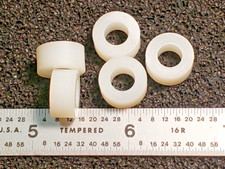 NYLON SPACERS  1/2"  ROUND  1/4"  HOLE  1/4" LONG  - 25 pcs