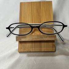 Cosmopolitan Eyeglass Frames White Black Angu...