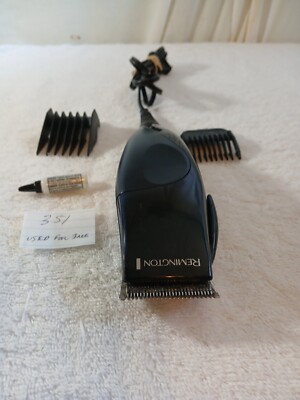 Remington Hair Clipper Black .MODEL HC 60 With 2 Clipper Attachment  USED