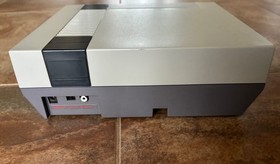 NES-001 Console With 2 Controllers, 1 Game, Zapper, Power Supply, and RF Switch