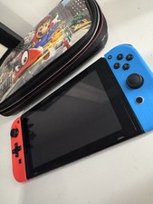 Nintendo Switch Console with Neon Blue/Neon Red Joy-Con Controllers, 2017