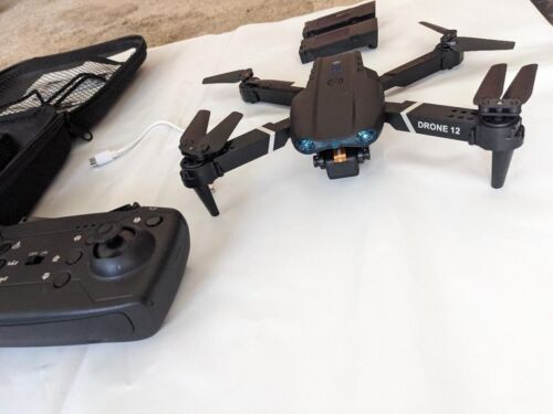 DRONE WITH CASE 2 SPARE BATTERIES PLUS ONE ON DRONE AN USB CHARGER - Picture 2 of 3