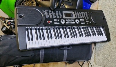 Hamzer Lighted Keyboard With Light Up Keys And Several Songs And Tones