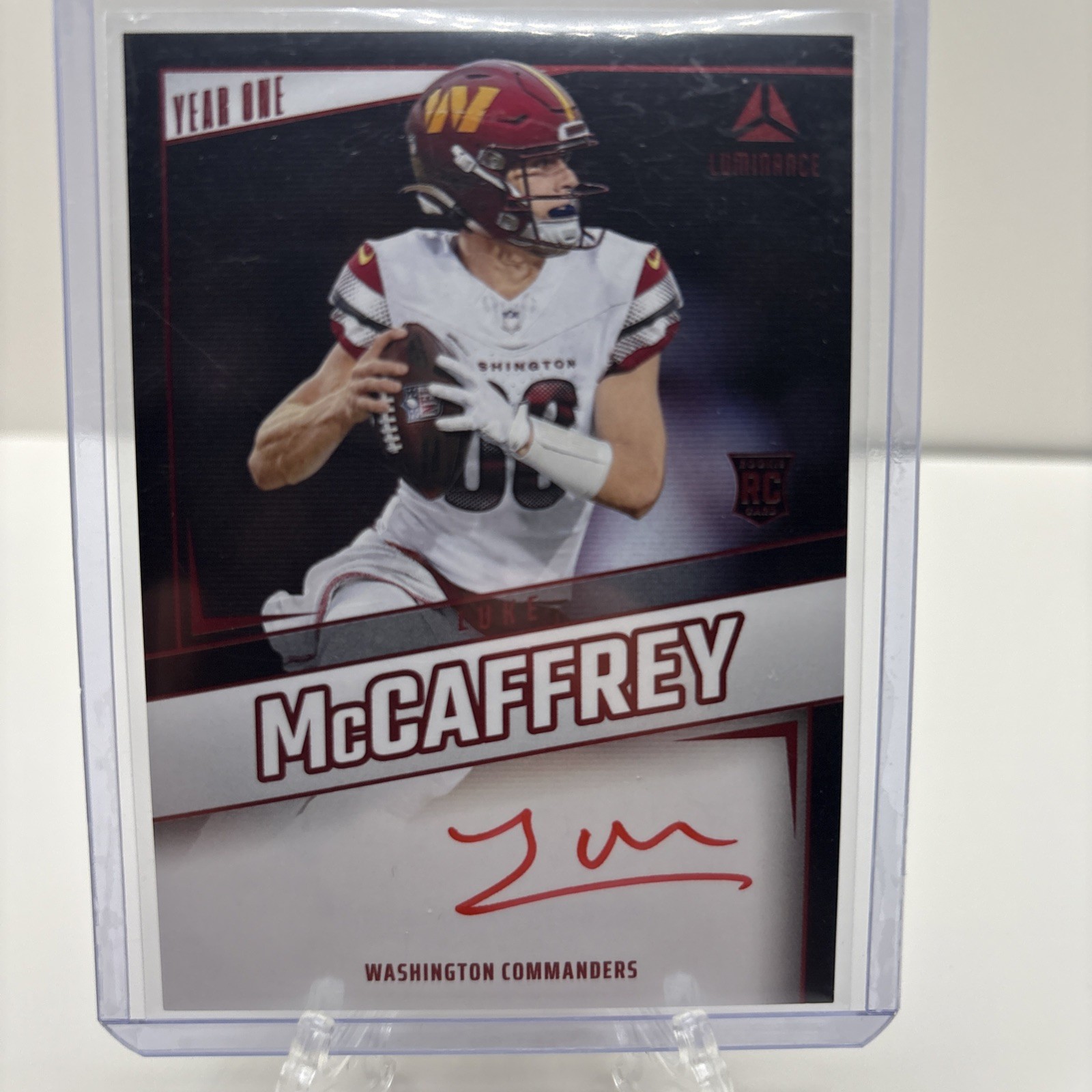 2024 Panini Luminance Luke McCaffrey Year One Signatures RPS RC Red Auto YOS-LMY