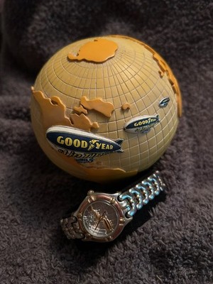 RARE - Goodyear Fossil ladies watch silver map face w/ 3 blimps and a globe case