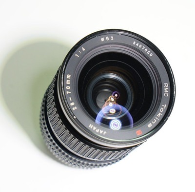 Tokina RMC 28-70mm 1:4 Objektiv Minolta MD Bajonett