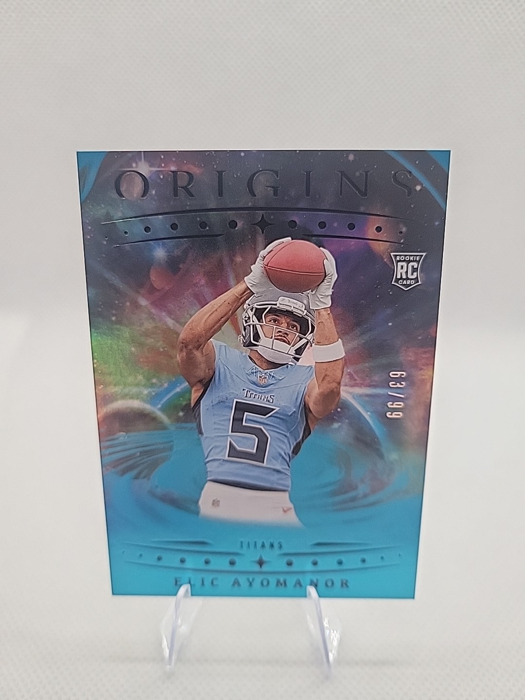2025 Panini Origins - Rookies Elic Ayomanor, Elic Ayomanor #108 Blue /99 (RC)