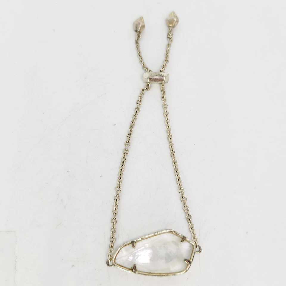 Brazalete Bolo Ajustable Kendra Scott Cambel Tono Dorado Blanco Madreperla Foto 3 de 4