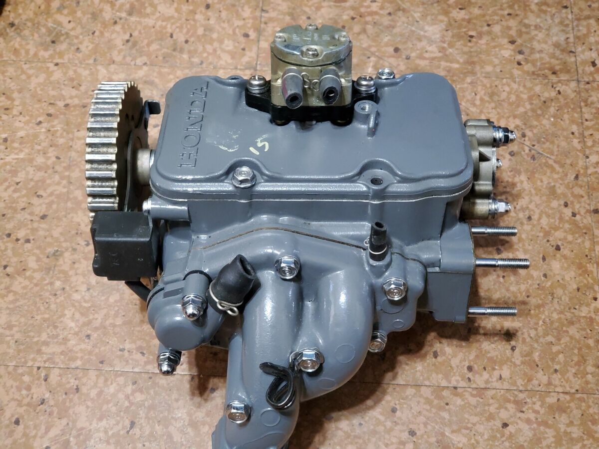 HONDA BF15 OUTBOARD CYLINDER HEAD COMPLETE HONDA BF15 OUTBOARD CYLINDER HEAD COMPLETE