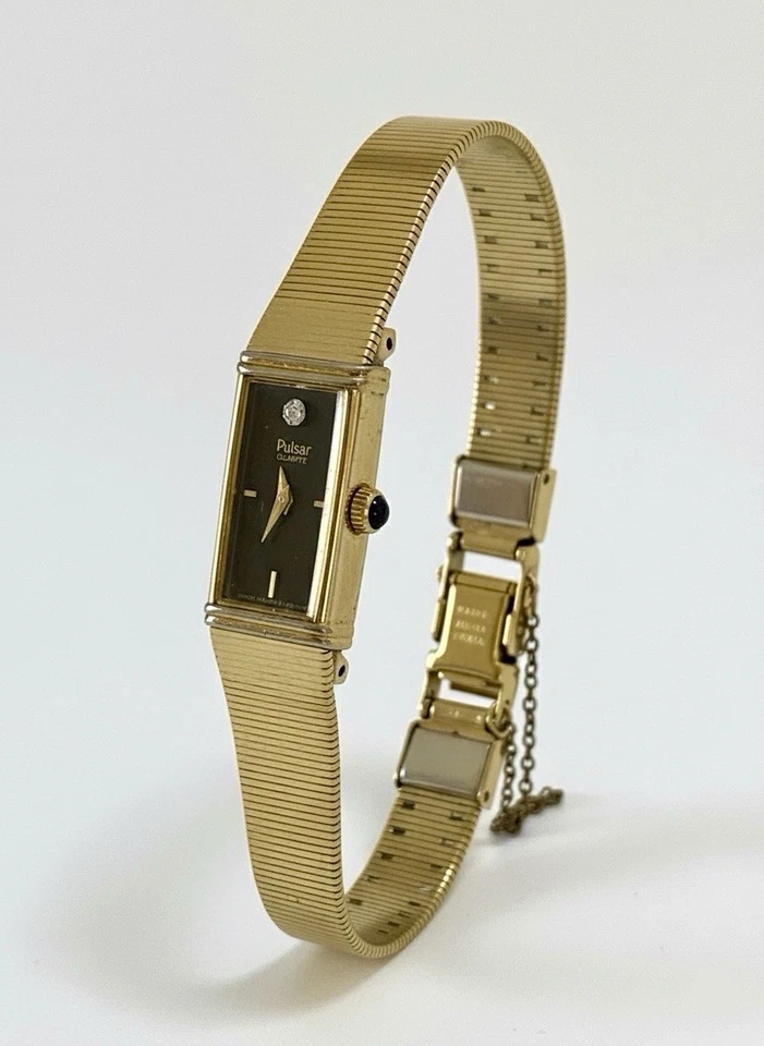 Reloj Pulsar vintage para mujer V220-5120 dorado esfera negra con corona de diamantes y ónix Foto 4 de 4