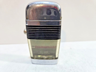 Funktionierendes Vintage Scripto Vu O'ROURKE LAGERUNG & ANHÄNGER CO Feuerzeug 7139/29