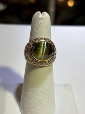 12.25 Carat Natural Cat’s Eye Chrysoberyl Ring in 18K Gold with 2.32ct Diamonds 