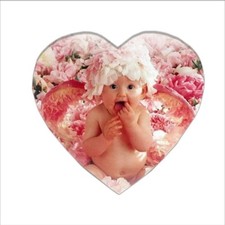 Magneti a forma di cuore  personalizzabili con foto a stampa sublimatica .