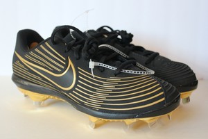 black and gold softball cleats