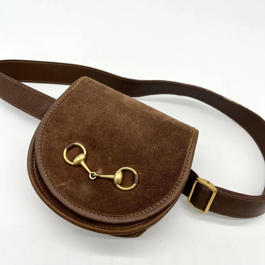 Pochette taille GUCCI vintage Horsebit montures dorées daim marron du Japon occasion 