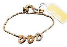 NEW MICHAEL KORS TRI-TONE ROSE,GOLD,SILVER 3 OPEN HEART CHARM SLIDER BRACELET