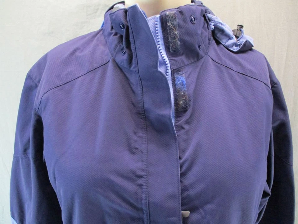 Chaqueta acolchada a prueba de viento con capucha forrada de vellón Sherpa azul talla M REI para mujer GR6245 Foto 2 de 4