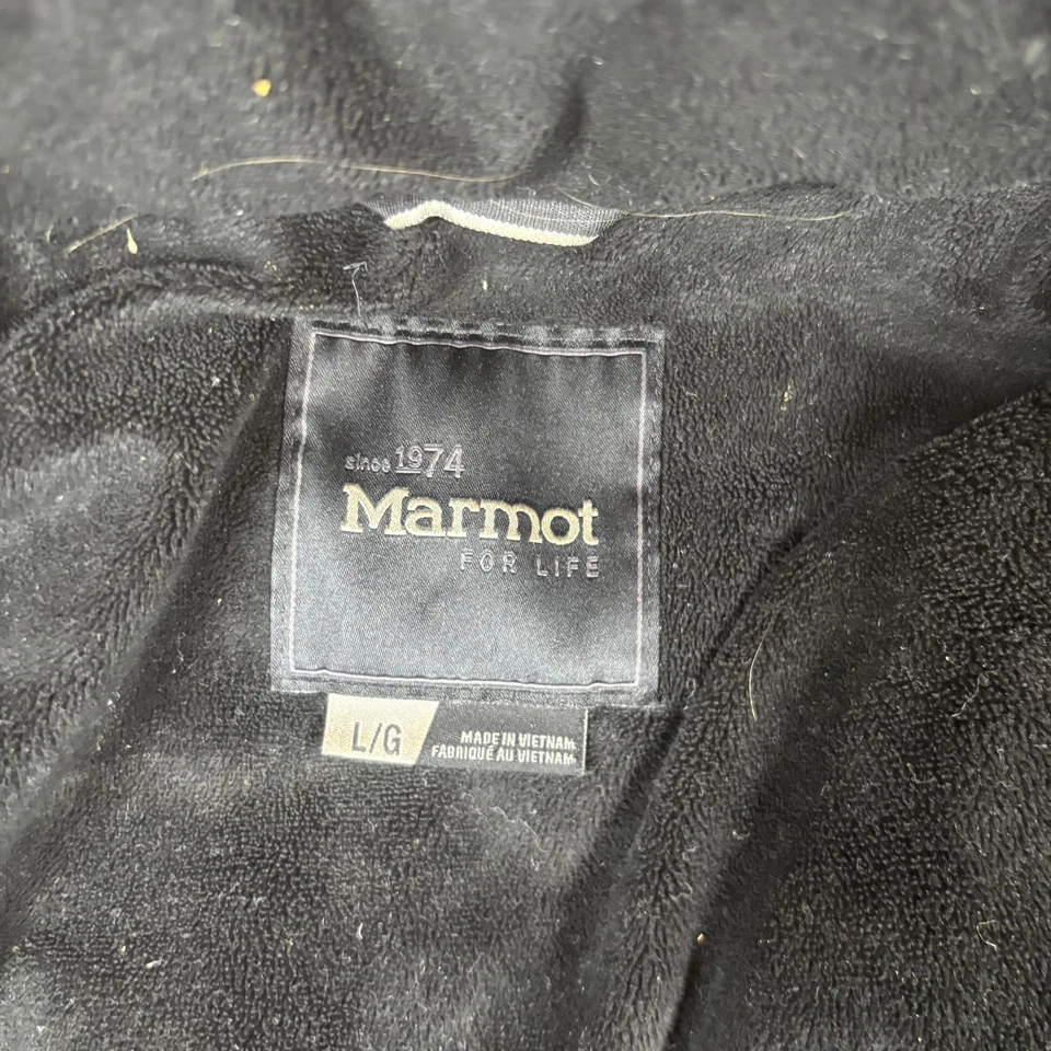 Abrigo largo acolchado Marmot para mujer grande negro Montreaux imitación piel capucha plumón polar Foto 3 de 4