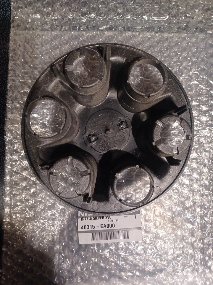 Tapacubos cubierta rueda Frontier Xterra 40315-EA000 NUEVO OEM Nissan 2005-2021 Foto 2 de 3