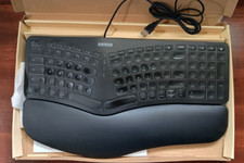 Ergonomic USB Wired Keyboard with Cushioned Wrist  Palm Rest, Backlit 7 Colo...