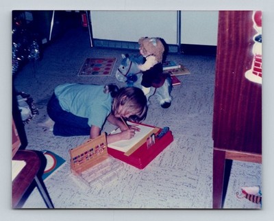 Girl Drawing with Art Kit 1970s Snapshot Photograph Rocking Horse Toys