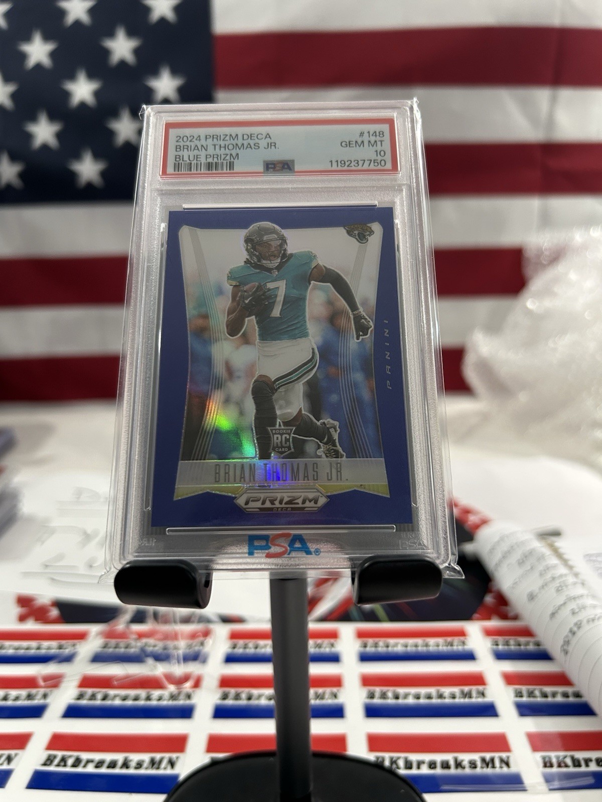 2024 Panini Prizm Deca #148 Brian Thomas Jr. Blue Prizm RC /149 PSA 10 Pop 4