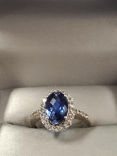 Sterling Silver Size 9 Ring With Oval Blue Stone and CZ