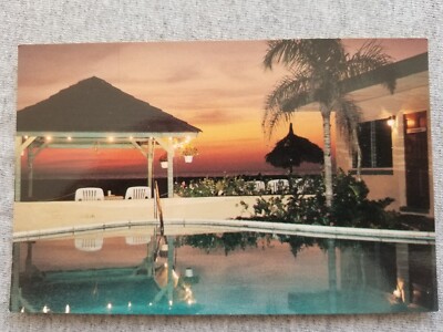 Treasure Island FL Captains Quarters Inn Vtg Postcard Pool Sunset Gulf of Mexico