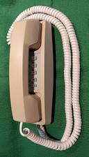 Vintage ITT wall mounted push button phone Beige Made in the USA