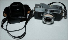 Vintage Minolta Electro Shot w/ Rokkor 40mm f1.8 lens case. VG cosmetics