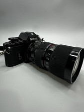 Nikon EM 35mm SLR Film Camera SOLIGOR 35  200mm Telephoto Zoom Lens  F:3.5 Macro