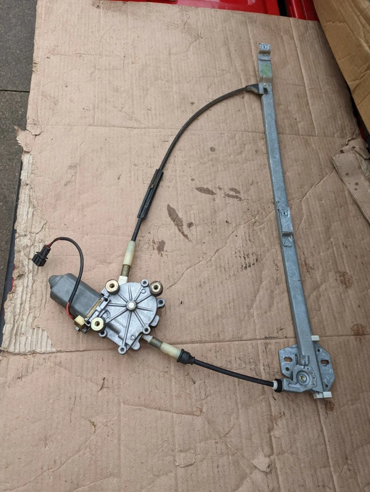 Volkswagen Eurovan 1992-96 regulador de ventana eléctrica y motor izquierdo 701959801 Foto 2 de 4