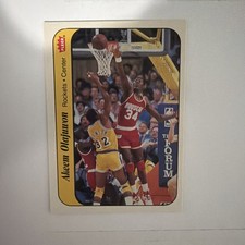 1986/1987 Fleer Basketball #9 Akeem Olajuwon 86/87 Sticker Set Card NM/MT hakeem